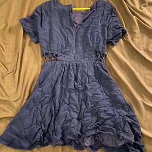Navy dress with see-through pattern on front waist